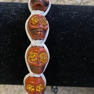 Vintage Mexican skull bracelet with macrame rope binding